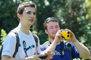 Jack Humiston '15 and David Chambers '14 measure clearings in the cloud forest using a GPS unit and a laser range finder. This allows them to calculate areas of deforestation.  The students worked on this project with an alum, Ian Pope. 