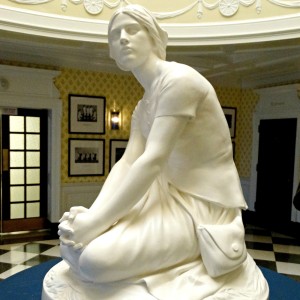 Restored Joan of Arc statue in the atrium of Ball Hall