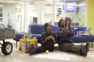 Sellam Birhane and Michael Middleton relax a little while organizing UMW's Stress-Free Zone. Photo by Karen Pearlman.