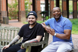 Chef Erik Bruner-Yang '07 was thrilled to be reunited with Associate Vice President and Dean of Student Life Cedric Rucker, who encouraged him when he was a full-time business student working at numerous Fredericksburg eateries. Bruner-Yang now owns five successful restaurants in Washington, D.C. Photo by Suzanne Rossi.