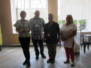 Prof. Al-Tikriti (2nd from right) at a Ukrainian polling station. 