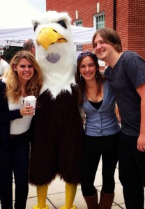 Students take advantage of some camera time with UMW's longtime mascot, Sammy D. Eagle in 2013. The old Sammy will pass the torch to his successor during tomorrow evening's Mary Rock event on Ball Circle. Photo by Katie Koth.
