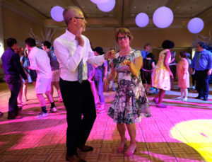 Kelly and Troy dance at his UMW inauguration celebration. To relax, the two like to binge-watch their favorite TV shows. Photo by Norm Shafer.