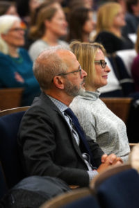 Kelly and Troy Paino attend a presentation by 2019 National Teacher of the Year Rodney Robinson at Dodd Auditorium early this year. Kelly gets a kick out of her title as UMW's "first lady." Photo by Suzanne Carr Rossi.