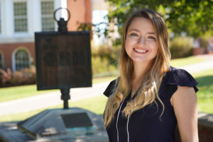 Senior Nichole Boigegrain is one of 34 UMW students elected to Phi Beta Kappa, one of the nation’s oldest and most prestigious academic societies. Here, she stands with the PBK marker on Campus Walk. UMW’s Kappa of Virginia chapter celebrates its 50th anniversary this fall. Photo by Suzanne Carr Rossi.
