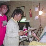 Williams and his mother visit Dr. Farmer on his 77th birthday in 1997.