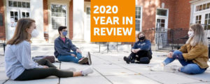 2020 Year in Review. Students sitting on Lee Hall Plaza, social distancing with masks. 