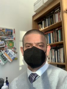 Jason Davidson dons a mask to teach a course during the COVID-19 pandemic.