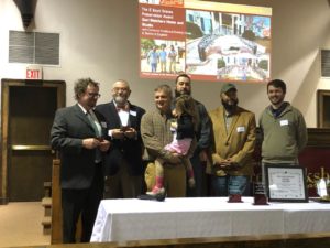 L-R: Steve Stokes, owner, Stokes of England Blacksmithing Company; Scott Harris, Executive Director, UMW Museums; Tim Winther, owner, Dominion Traditional Building Group (with daughter Lillian); Hunter Shackleford (UMW ’20), Lawrence King (UMW ’20), and Sam Biggers (UMW ’16), all of Dominion Traditional Building Group.