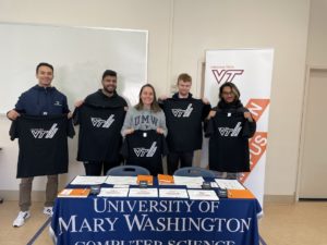 From left to right, UMW students Steven Deverteuil, Arsalan Ahmad, Meghan Cooke, Dylan Meyers and Suad Parvez gathered in Farmer Hall Tuesday for an event recognizing students either accepted to or interested in a master of engineering in computer science pathway agreement between UMW and Virginia Tech.