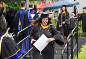 After receiving their diplomas, graduates from UMW’s College of Arts and Sciences, College of Business and College of Education posed for photos. Photo by Suzanne Carr Rossi.
