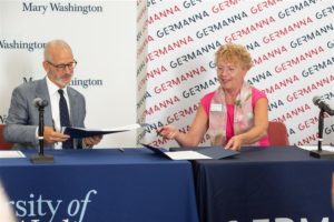 UMW President Troy Paino and Germanna President Janet Gullickson sign an agreement creating a pathway between the two schools to put students on a fast track toward a business major. Photo by BC Photography.