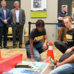 From left, U.S. Rep. Rob Wittman, R-Virginia, and University of Mary Washington’s Dr. John Burrow watch as King George high-schoolers Samantha Jones, Susan Randall and Ashton Jones compete in last year’s debut of the Innovation Challenge @ Dahlgren. Back right are UMW Assistant Professor of Special Education Kevin Good and Dahlgren Campus Director Michael Hubbard. The second annual event is set to take place March 31 to April 1, 2023. (U.S. Navy photo/Released)