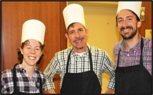 Holiday Volunteers Shannon Hauser, Jerry Slezak and Cartland Berge were very merry in their chef hats!