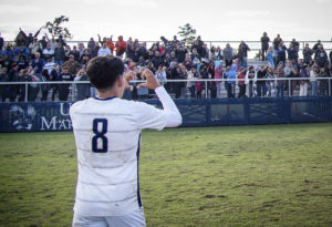 UMW soccer player Diego Guzman shows the crowd some love during the UMW men’s soccer game against Ohio Wesleyan. Photo by Tom Rothenberg.