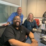 James Farmer Multicultural Center Assistant Director Chris Williams (foreground) with Town Talk host Ted Schubel and the City of Fredericksburg's Victoria Matthews.