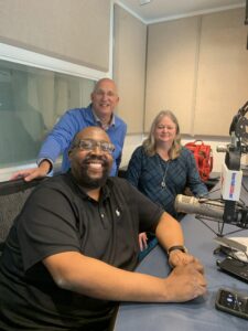 James Farmer Multicultural Center Assistant Director Chris Williams (foreground) with Town Talk host Ted Schubel and the City of Fredericksburg's Victoria Matthews.