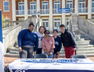 UMW students participated in a six-day event to recognize ASPIRE, an acronym that stands for Mary Washington’s core values. Pictured here, from left to right: newly elected SGA President Jaylyn Long ’24, who conceived the idea for ASPIRE Week; current SGA President Joey Zeldin ’23; Martina Pugh; Conner Rogers; and Carlos Nunes. Photo by Sam Cahill.