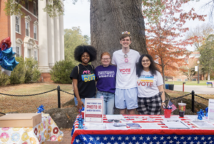 From left to right: Kaylah Lightfoot, Kate McDaid, Jorrin Casa de Calvo and Merna Mousa participate in Day on Democracy at the University of Mary Washington. The Election Day event encourages voter participation and fosters a sense of community and responsibility. Photo by Sam Cahill.
