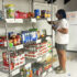 Photo of a student stocking shelves in the Gwen Hale Resource Center.