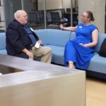 UMW Associate Professor of Biological Sciences April Wynn talks with Richard Groover of George Mason University during the annual meeting of the Virginia Academy of Science, held at Mary Washington.