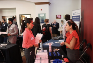 An accounting student speaks with a potential employer at a recent Business Career Pathways event hosted by UMW&rsquo;s College of Business.