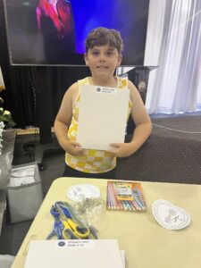 Killian Peck with one of the STEM boxes he ripped into this summer!