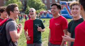 President Paino is seen here conversing with students during the uniquely UMW tradition of Devil Goat Day, celebrating its 100th anniversary this year.