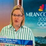 woman seating in studio and speaking