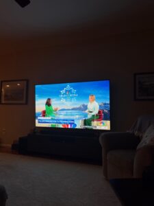 two woman sitting at a desk for a discussion