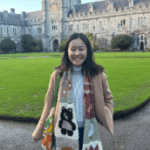student pictured in Ireland in front of castle