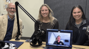 Photo of President Paino with students that appear in episode three of the UMW podcast