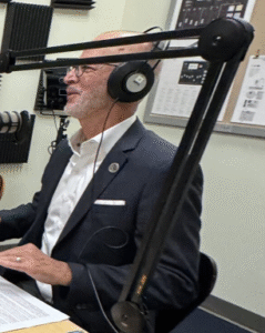 Photo of UMW President Troy Paino hosting UMW's podcast