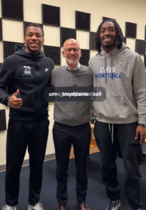 Photo of President Paino pictured with podcast guests, UMW men’s basketball co‑captains Kye Robinson ’27 and Jay Randall ’26