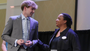 Adam McAninley and Dean Jones onstage at the awards assembly