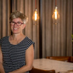 photo of Professor of Sociology Leslie Martin in a black and while striped shirt
