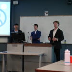 students presenting their case at the competition