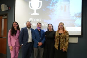 "judges and student winners pose at the 2026 Case Competition