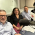 Marcel Rotter, Brooke Di Lauro, and Keith Mellinger sit together at a table to record the episode at WFVA