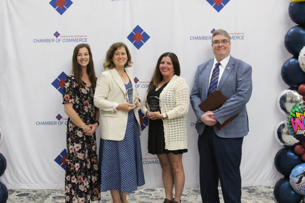 Walker, Towery, Peck and O'Donnell standing posed at the awards event