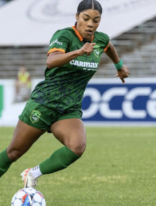 Richmond Ivy soccer player with the ball