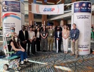 Students gathered in the lobby of a hotel