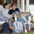 Two UMW students sitting in chairs on Ball Circle